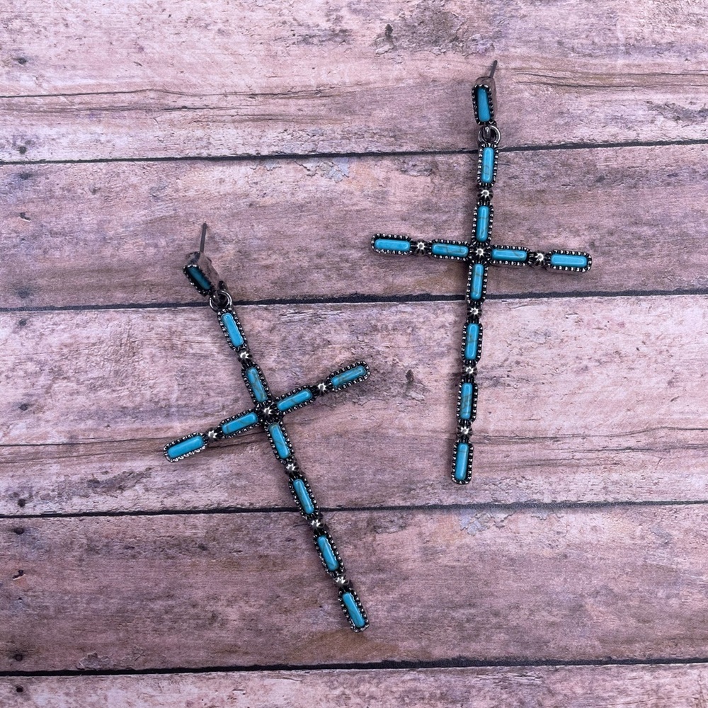Fashion statement cross earrings